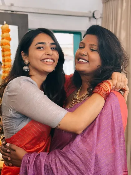 A heartfelt hug with a dear friend during our Dasara celebration. My boutique is a place of community and love.