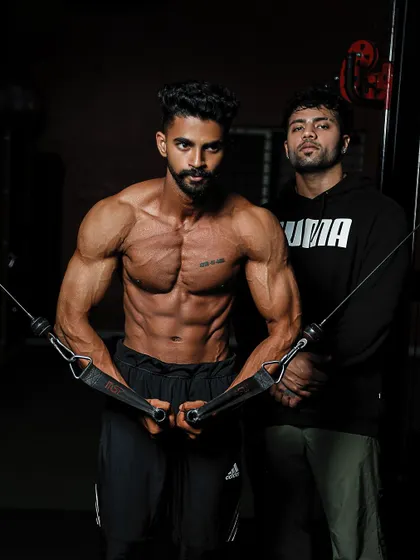 Another shot with my client, showcasing the incredible physique he built. We work as a team to achieve these results.