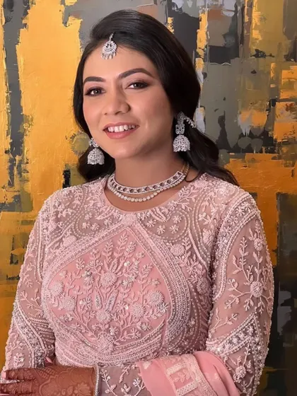 A beautiful engagement bride with her hair styled in soft, open waves. This elegant look is perfect for a formal ceremony, providing a touch of glamour without being overdone.