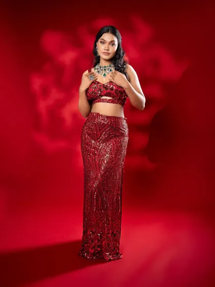 A full-length shot that captures the glamour and sparkle of the entire look.