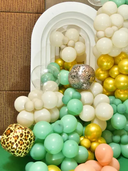 Another detail shot of the modern jungle decor, showing the unique animal-print balloons.