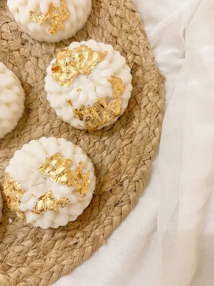 Happy Diwali! Our flower-shaped candles with gold leaf are a special creation for the festival of lights.