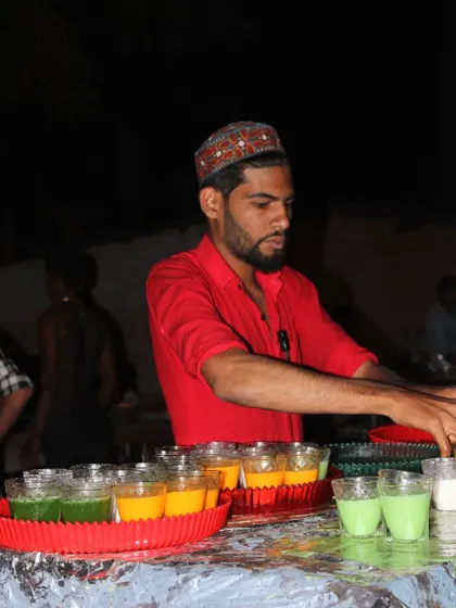 Our staff preparing trays of colorful juices and mocktails, ensuring guests are always refreshed throughout the event.