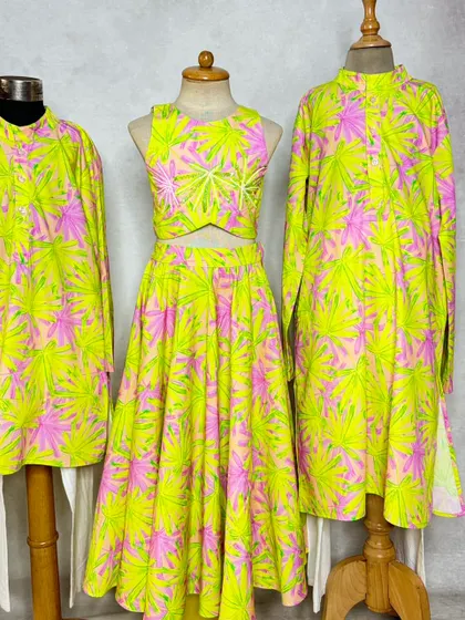 Our popular Neon Leaves print, shown here as a coordinated set for two brothers and a sister. We can create multiple styles using the same fabric for the whole sibling crew.