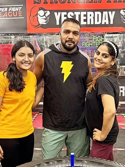 Posing with members of the team. The energy is always positive.