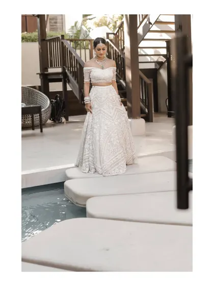 A beautiful bridal portrait by the water at the resort in Thailand.