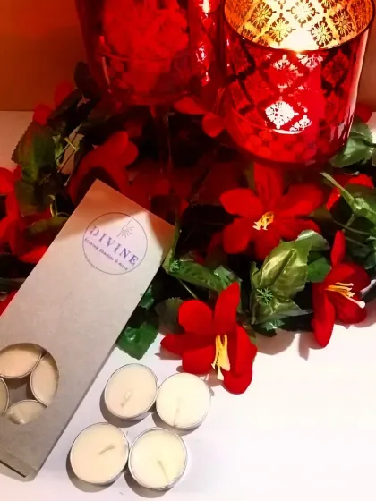 A festive setup with my unscented tealights, showing how they can be used to complement decorative holders and floral arrangements.