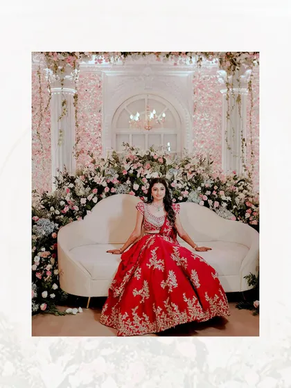 Another stunning solo portrait of the bride on the reception stage. Her look is the epitome of bridal grace.