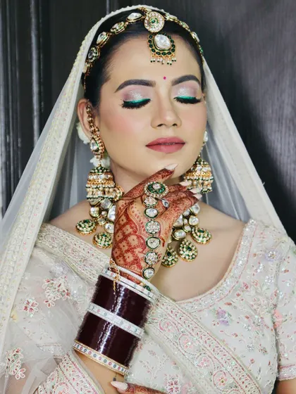 A close-up with eyes closed, perfect for seeing the detail in the eyeshadow.