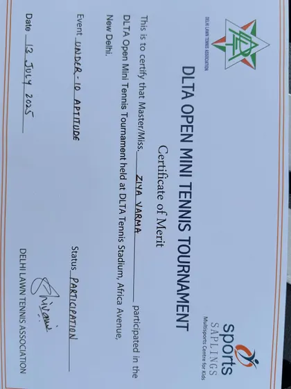 A close-up of Ziya Varma's Certificate of Merit for participating in the Under-10 event at the DLTA Open Mini Tennis Tournament. This marks the start of her competitive journey.