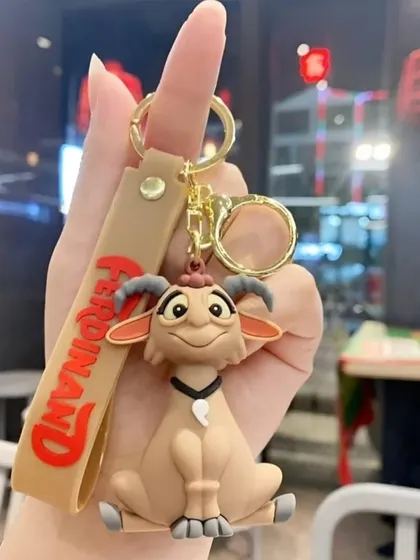 This keychain features the goat character from the movie Ferdinand. Each keychain comes with a matching character strap.