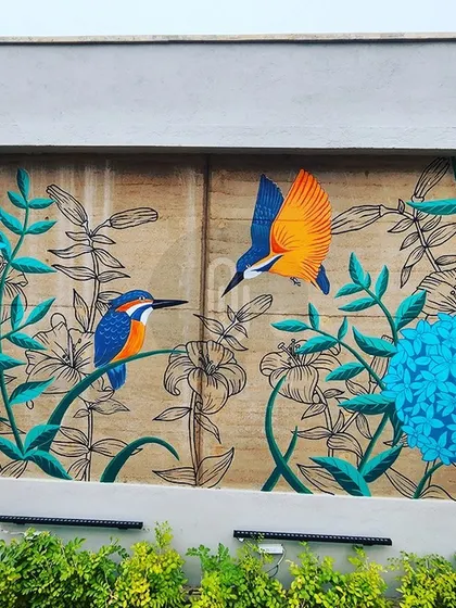 This mural features two beautiful kingfisher birds among stylized flowers and leaves. The combination of realistic birds and graphic foliage creates a unique and modern look.