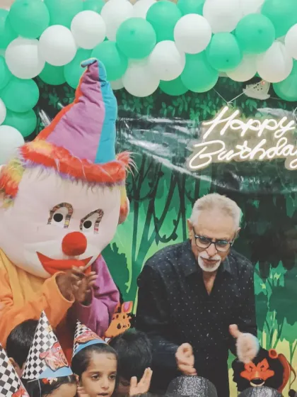 A great shot of the Joker mascot with the birthday boy's grandfather.