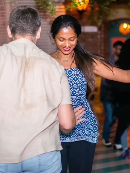 A graceful and elegant pose during a dance.