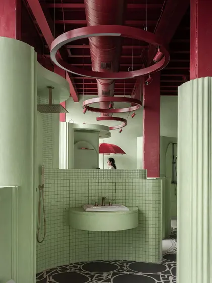 A shot of our Sorbet showroom project, featured by Dezeen, showcasing our playful use of mint-green and berry-red.