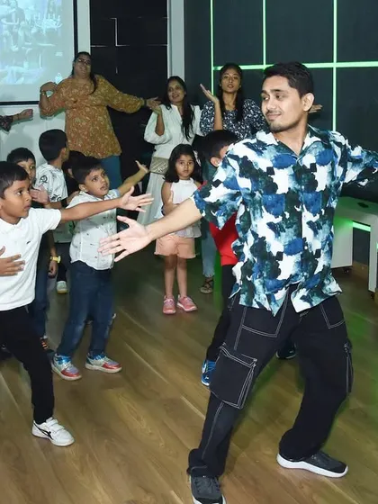 Moments from a high-energy dance party and workshop for kids. These events are full of fun, learning basic choreography, and enjoying dance in a group.