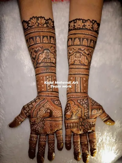 This is a full coverage bridal design created by my talented team. The patterns are consistent and flawlessly executed, showcasing our commitment to quality even on large orders.