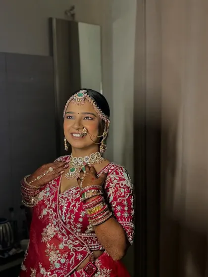 Another angle showing the complete Varmala look, with the matha patti and nath perfectly in place.