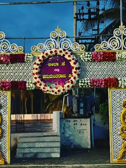 Another example of a grand entrance gate decoration. The personalized floral wreaths welcome the guests to the celebration.