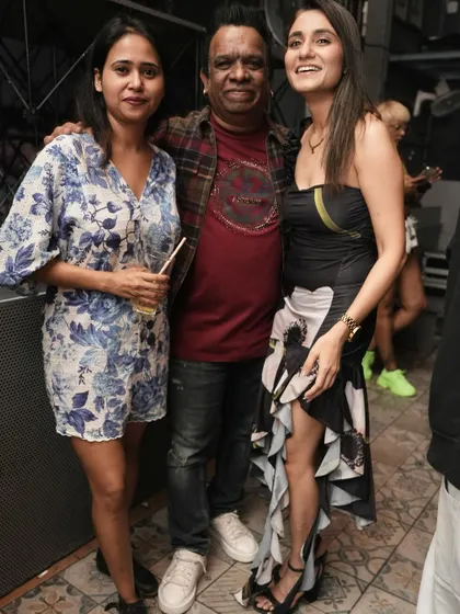 Posing with a friend at the party.