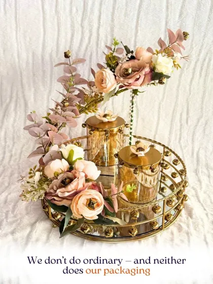 I don't do ordinary, and neither does my packaging. This stunning gold-toned hamper with a mirrored tray and ornate jars is a testament to my commitment to luxury.