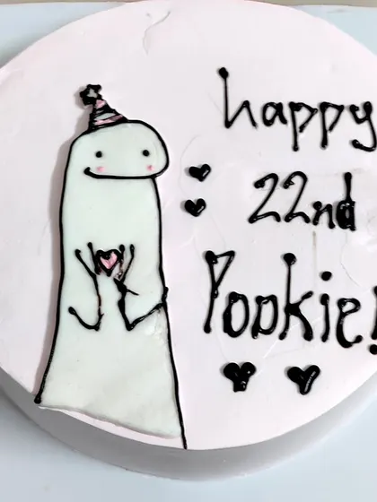 The pookie in your life deserves this cake! 🤌🏻🩷 A minimalist and trendy cake featuring a cute meme character, perfect for your Gen-Z partner or friend.