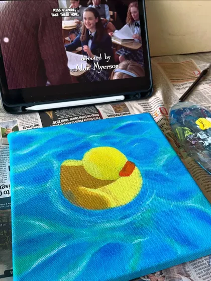 My ideal painting setup: a work-in-progress on the easel, my paint palette, and a good show playing in the background. This is my happy place.
