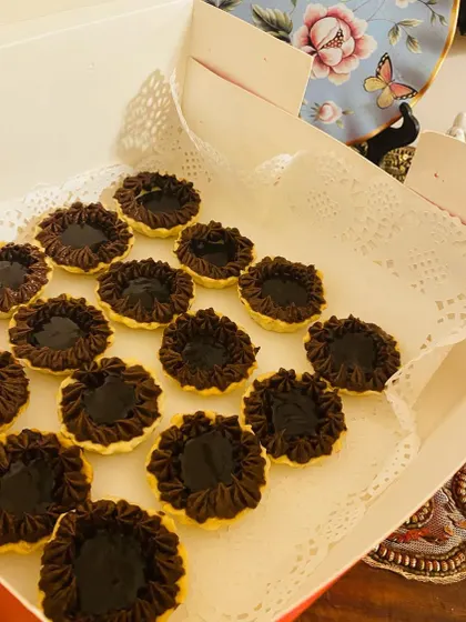 A box of my divine chocolate tarts, all packed up and ready to go to a happy customer.