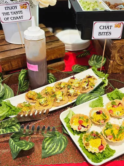 Our chaat setup is designed to be both beautiful and functional. We offer a variety of toppings and chutneys so guests can create their own perfect bite, from spicy sev puri to sweet and sour tokri chaat.