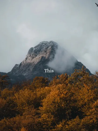 If you are looking for a sign to travel, this is it. A majestic mountain peak wrapped in clouds is calling your name.