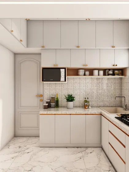 The design includes a dedicated niche for the microwave, keeping the countertop free for food preparation.
