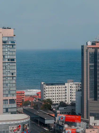 A view of the ocean framed between two modern buildings in Colombo. I love how this composition highlights the city's identity as a coastal metropolis.