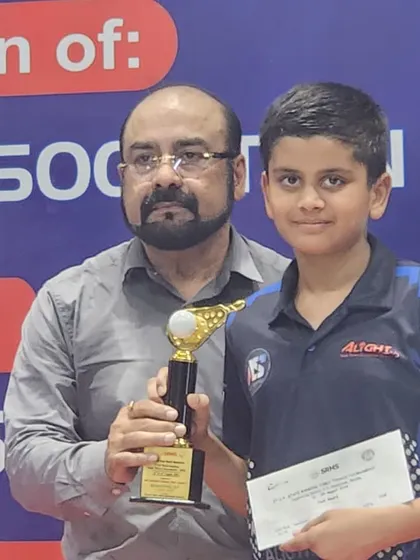 Arnav Jain with his trophy after securing a medal in the U-13 Boys category at the UP State tournament.