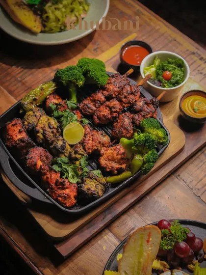 Our Grand Platter is an opulent celebration of Middle Eastern and Indian flavors. Crafted for the bold and the flavor-obsessed, this platter is an experience in itself.