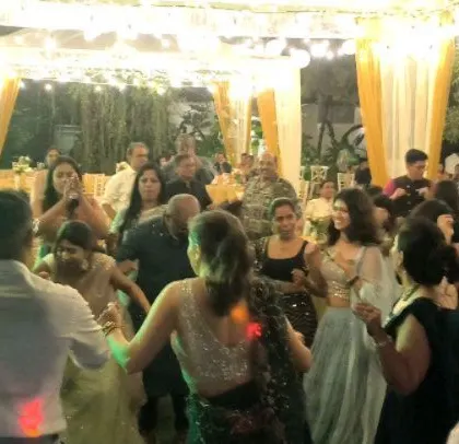 The guests are all smiles as they dance the night away.