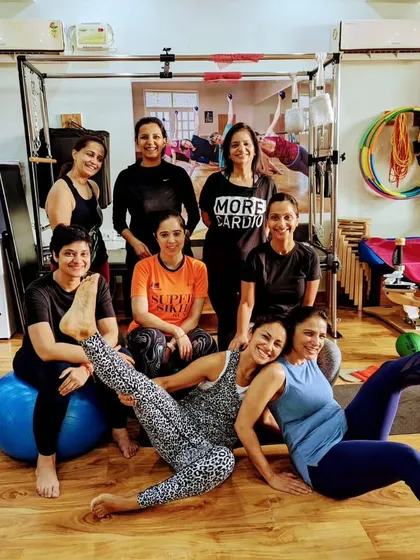 Just a typical day at the studio, full of strength, flexibility, and a lot of fun.
