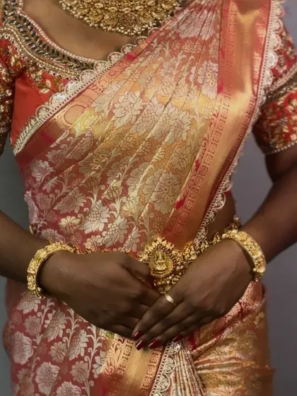 The elegance of a Kanjeevaram saree is unmatched. Here, the drape is kept classic and clean to let the rich fabric and temple jewellery shine.