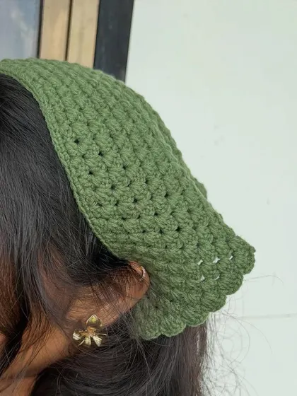 A side profile showing how the boho bandana sits. It’s a versatile piece that can be worn as a headband or to cover your hair.