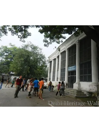 A view of the library's facade with its prominent colonial-era columns. The building is a fascinating blend of Mughal and British architectural styles.