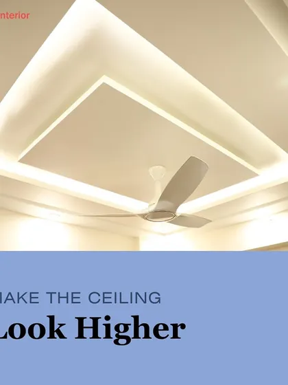 A simple and effective way to make a ceiling look higher is with a tray design and cove lighting, as shown in this clean, modern example.