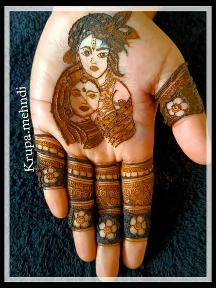 A detailed portrait of Radha and Krishna, perfect for a bride who wants to carry their blessings. I offer specialized classes for learning figure and portrait work.