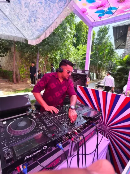 At the console for a colorful mehndi event in Pushkar. The vibrant decor and outdoor setting created a fantastic atmosphere for the celebration.