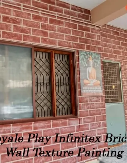 We applied a Royale Play Infinitex brick wall texture to this exterior-facing wall, earning a 4-star review. This durable finish gives the appearance of real brick, adding rustic charm and character to the home's facade.