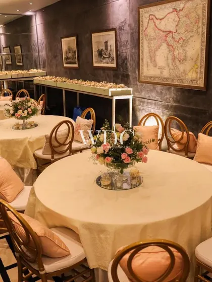 The dining area for our vintage royal theme. The room features classic furniture, soft lighting, and historical maps on the wall, creating a sophisticated and unique dining experience.