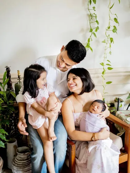 A candid family portrait filled with smiles and laughter. My goal is to make you feel comfortable so I can capture the real, happy moments between you.