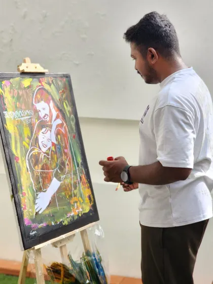 Taking a moment to step back and look at the painting's progress. This helps me ensure the composition and colors are perfectly balanced to reflect the atmosphere of the celebration.