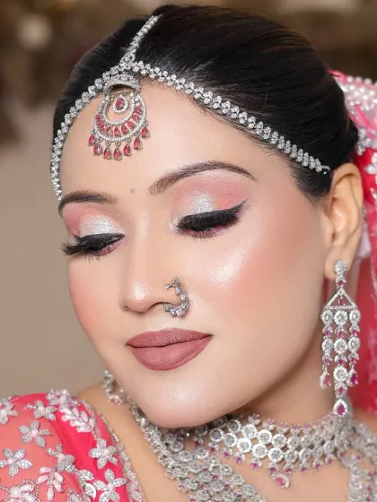 A close-up of the final look, showing the precision of the winged liner and lip shape.