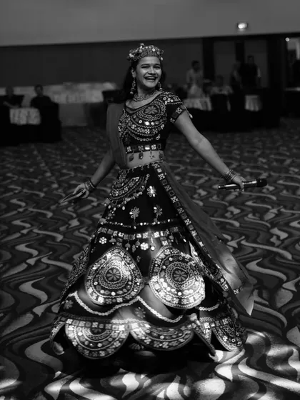 A classic black and white photo capturing my joy while hosting a Navratri event.