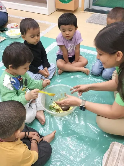 Each activity, from making Bhel Puri and toast to plucking methi leaves and exploring what floats, is a lesson in itself. These practical life and sensorial activities are central to the Montessori method, helping children develop fine motor skills, concentration, and a deep understanding of the world through their own actions.