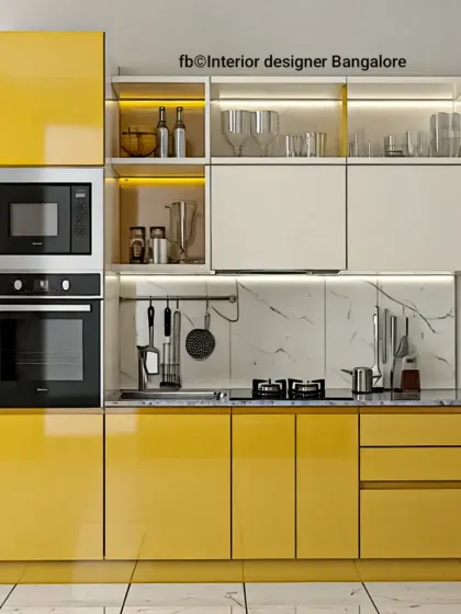 This straight-line kitchen design is bright and sunny, with vibrant yellow cabinets and a white marble-effect backsplash. The tall unit houses the oven and microwave, ensuring an efficient use of space in this stylish kitchen.